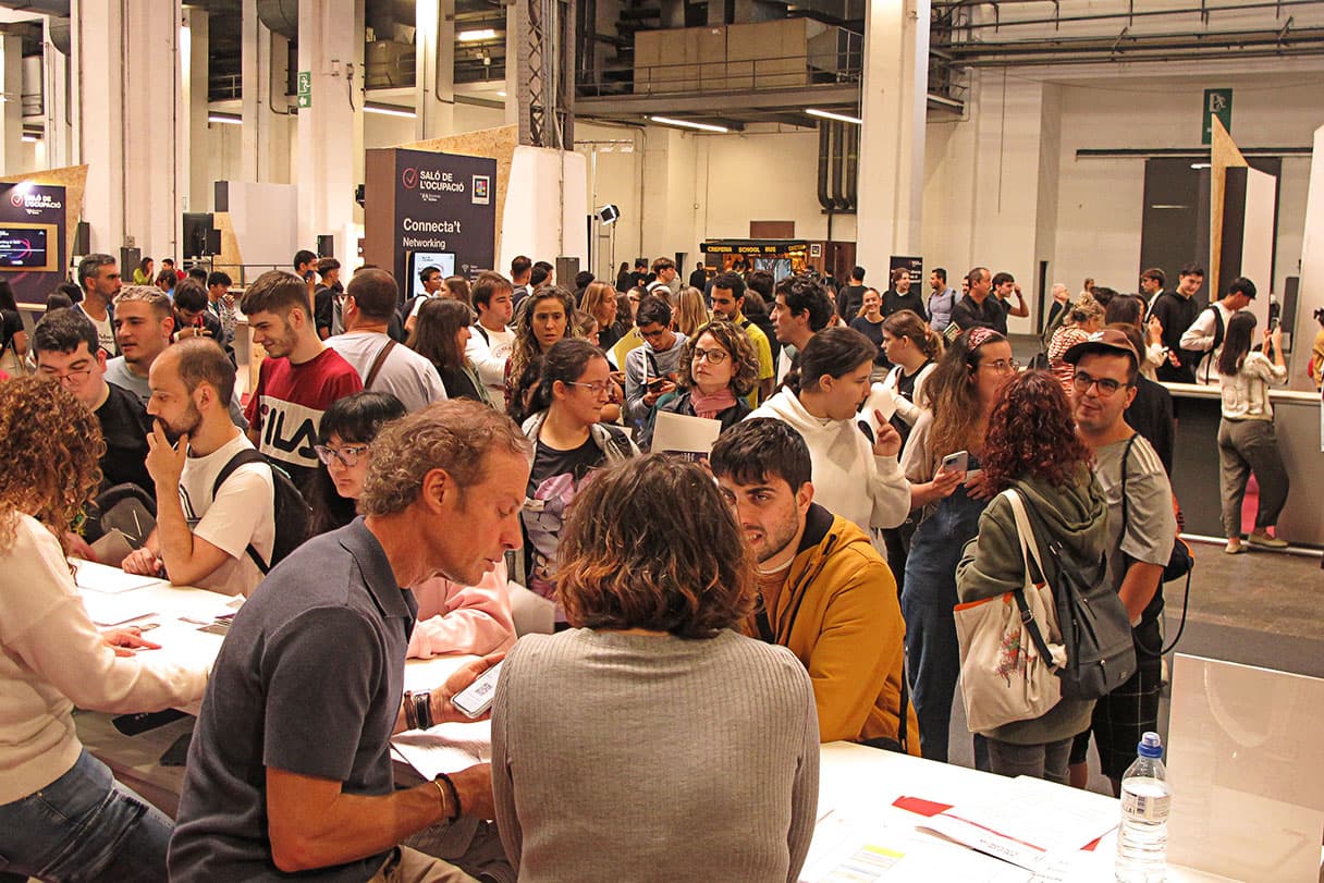 Professionals reunits durant les activitats de la fira